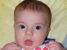 baby with food on his nose